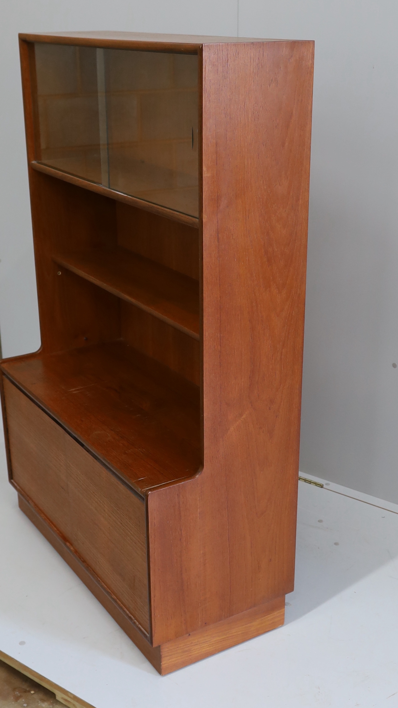 A mid century G Plan teak wall unit, width 91cm, depth 41cm, height 140cm